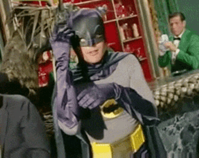 Adam West as Batman, dancing the fancy disco moves.